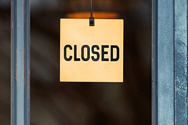 Image of close sign on a door